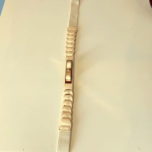 Cream and gold elastic belt